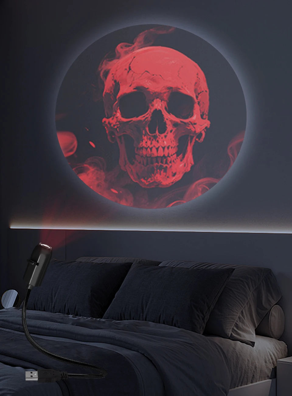 Second skull-themed projection image on a wall.
