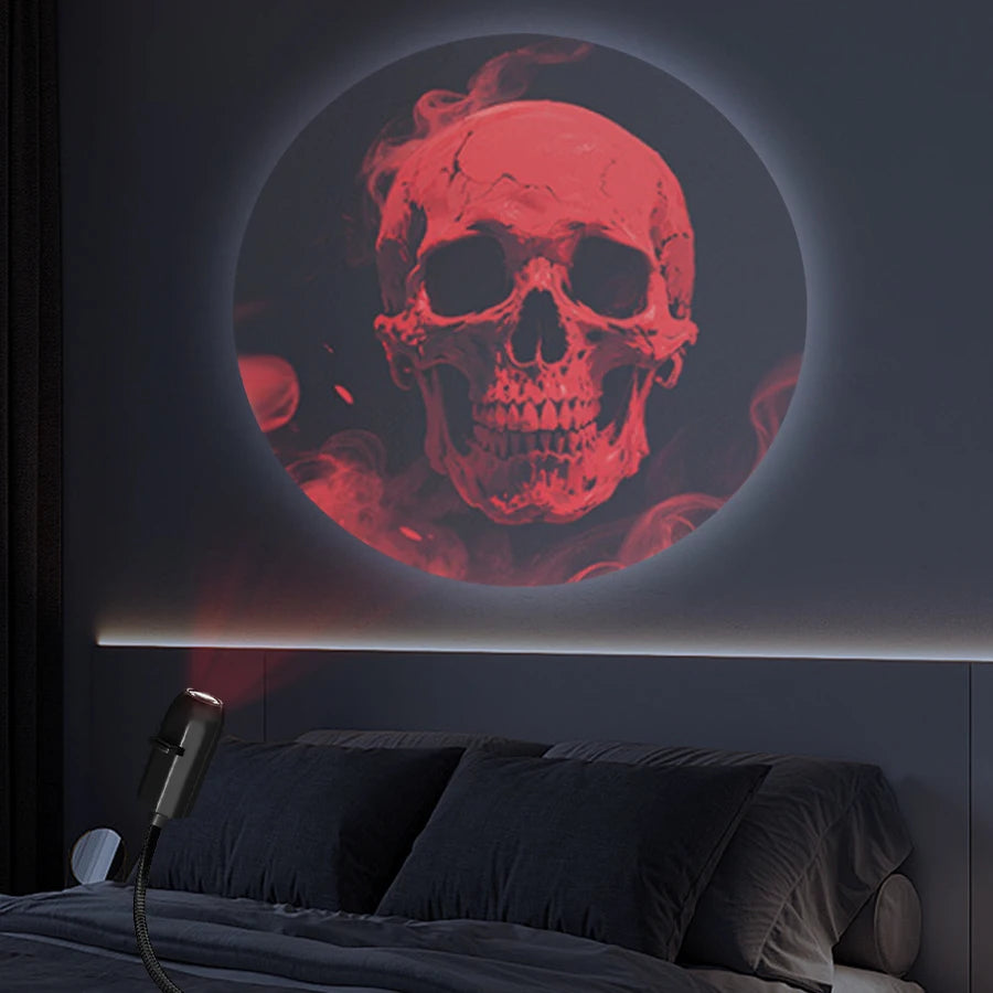 Red skull pattern projected on an apartment wall at night.