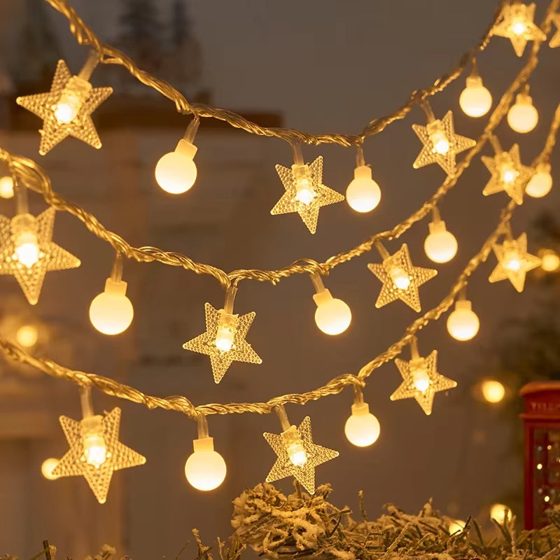 Rows of warm white star string lights hanging for holiday decoration