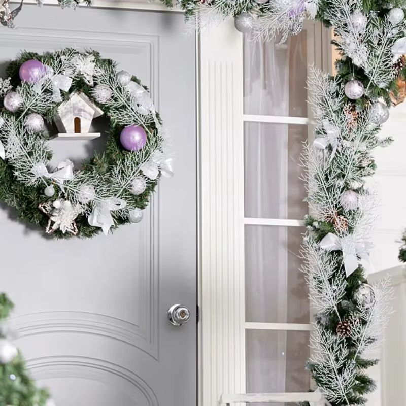 White pine spray paired with greenery and red berries for festive contrast