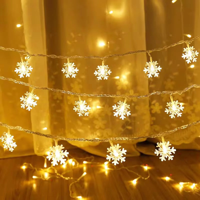 Golden-toned snowflake LED string lights used for a warm festive ambiance