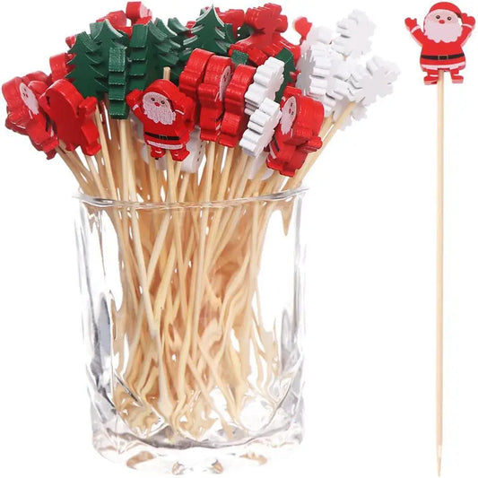 Jar filled with bamboo Christmas fruit picks featuring Santa, snowflakes, reindeer, and trees