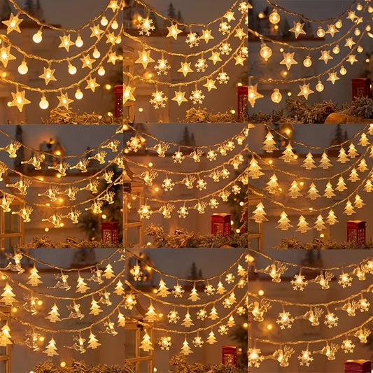 Warm white snowflake and star string lights layered in multiple rows creating a festive glow