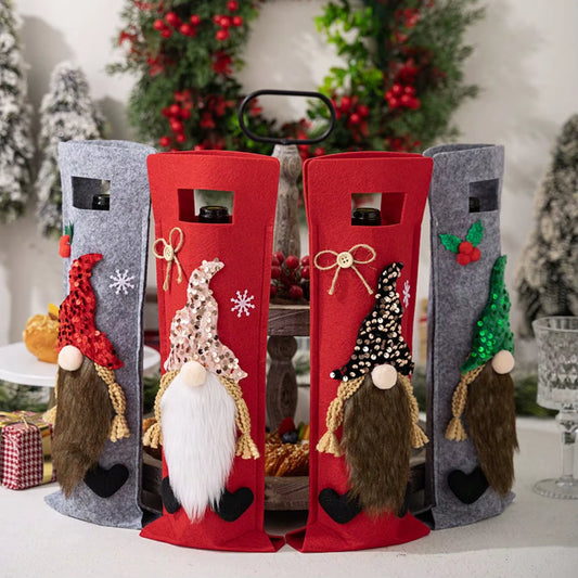 Four Christmas 2026 gnome wine bottle covers displayed together on a festive table scene