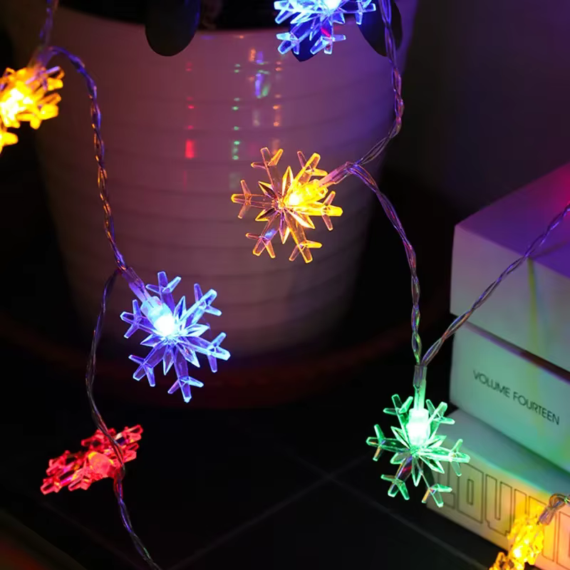 Multicolor snowflake LEDs around a mirror adding colorful Christmas lighting