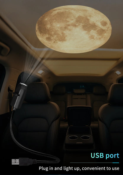Moon/planet projection on a car roof interior at night.