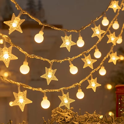 Rows of warm white star string lights hanging for holiday decoration