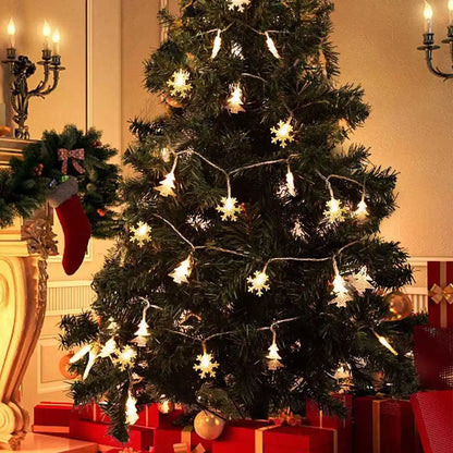3 m warm white snowflake and star string lights wrapped around a Christmas tree